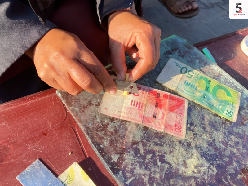 شرطة غزة تلزم التجار بتداول العملات الورقية غير التالفة